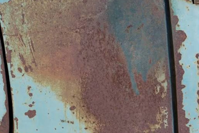 Rusty Metal Surface with Various Stains and Weathered Textures