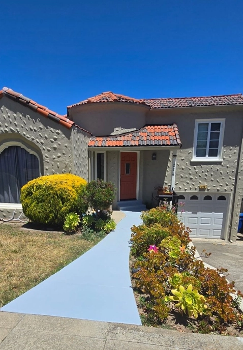 Stucco House with Red Door and Manicured Garden, Painting Contractors San Jose