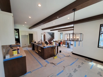 Kitchen Interior with Wood Staining and Preparation for Renovation in Progress